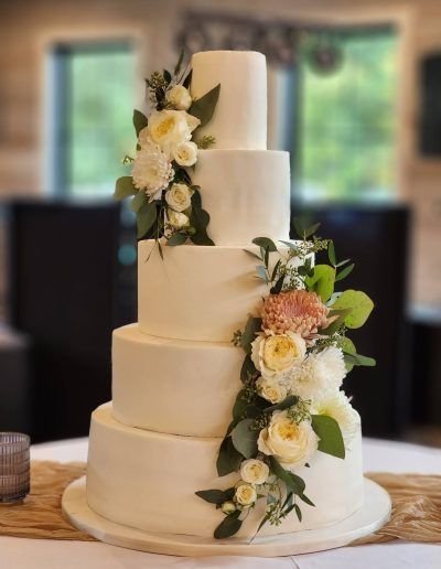 Smooth White Wedding Cake with Fresh Flower Cascades